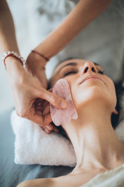 hands demonstrating gentle circular massage movements around eye area