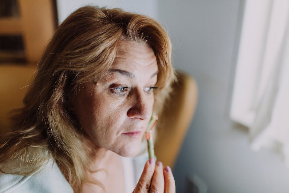person enjoying peaceful moment during eye relaxation routine in natural lighting